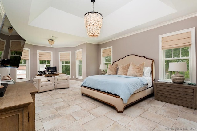 bedroom featuring ornamental molding, a raised ceiling, and a chandelier