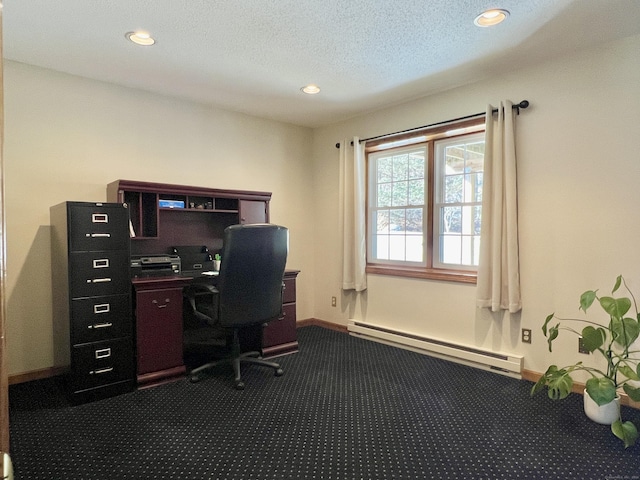 carpeted office space with a baseboard radiator and a textured ceiling