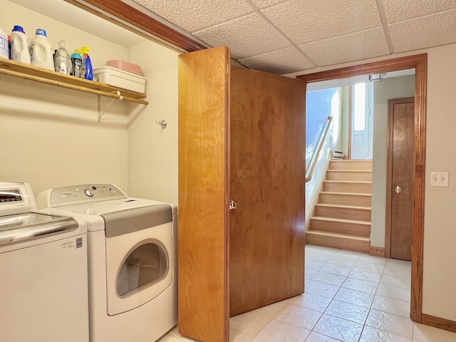 washroom featuring washer and dryer