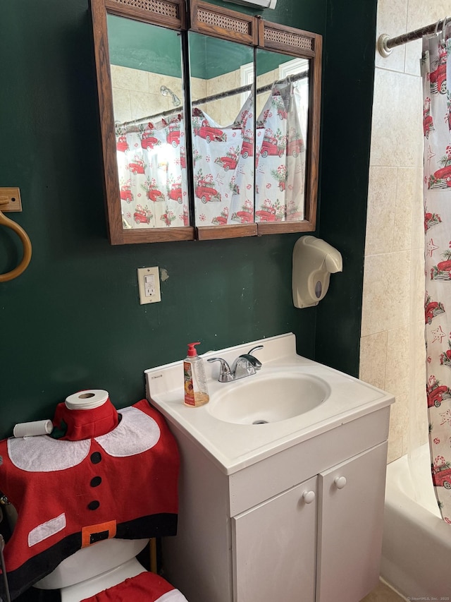 bathroom with vanity and shower / tub combo