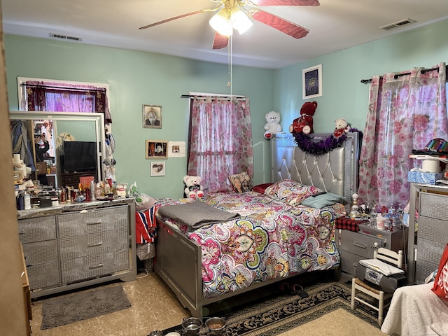 bedroom featuring ceiling fan