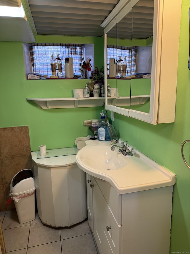 bathroom with vanity and tile patterned floors