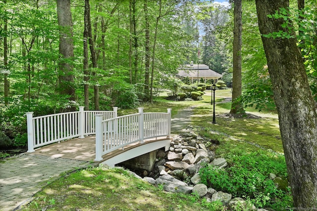 view of property's community with a wooden deck