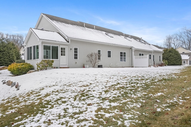 view of snow covered property