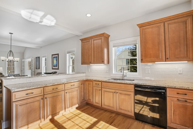 kitchen with sink, tasteful backsplash, light hardwood / wood-style flooring, dishwasher, and kitchen peninsula