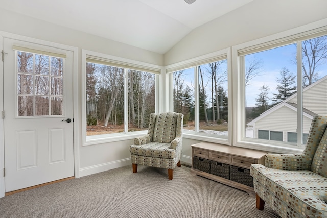 sunroom / solarium with lofted ceiling