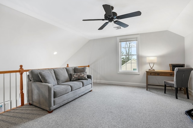 carpeted living room featuring vaulted ceiling and ceiling fan