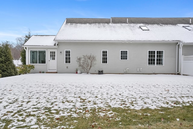 view of snow covered house