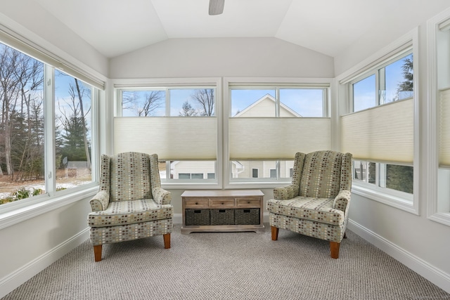 sunroom with lofted ceiling, a wealth of natural light, and ceiling fan