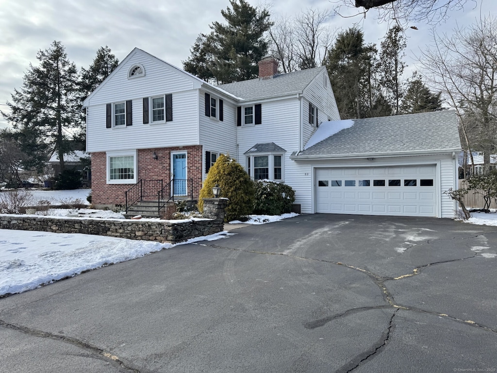 view of front of property with a garage