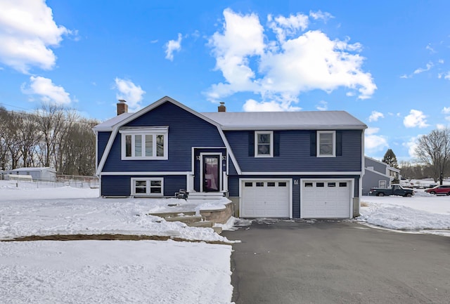 raised ranch with a garage