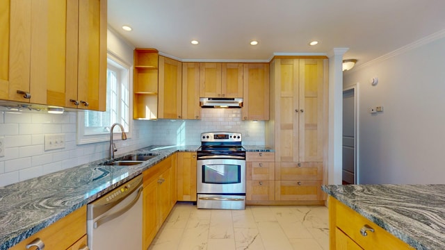 kitchen featuring tasteful backsplash, appliances with stainless steel finishes, stone countertops, and sink