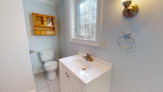 bathroom with vanity, tile patterned flooring, and toilet