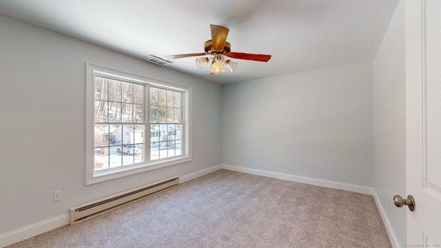 unfurnished room featuring ceiling fan, light carpet, and a baseboard heating unit