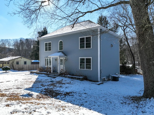 view of front facade featuring central air condition unit