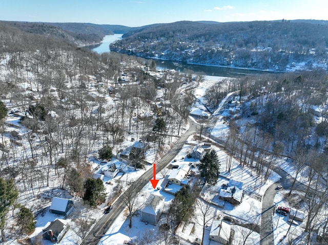 snowy aerial view with a mountain view