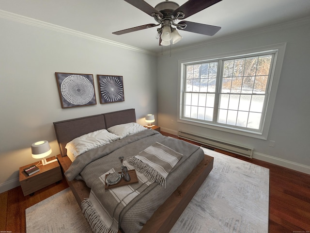 bedroom with wood-type flooring, ornamental molding, ceiling fan, and baseboard heating