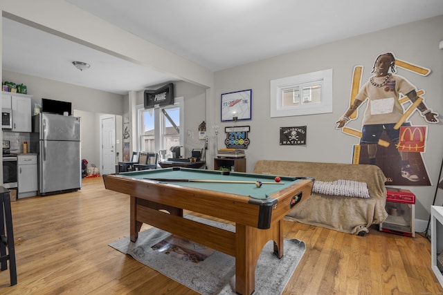 game room featuring pool table and light hardwood / wood-style flooring