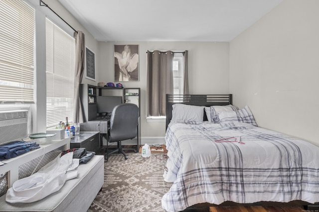 bedroom featuring multiple windows