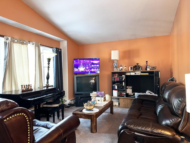 living room featuring lofted ceiling and carpet flooring