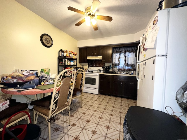 kitchen featuring ceiling fan, white appliances, dark brown cabinets, and a textured ceiling