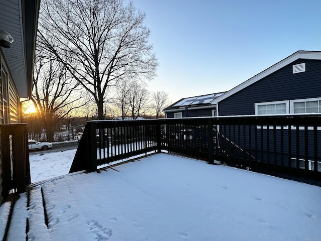 view of snow covered deck