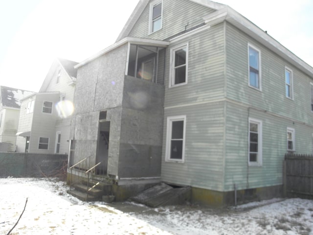 view of snow covered house