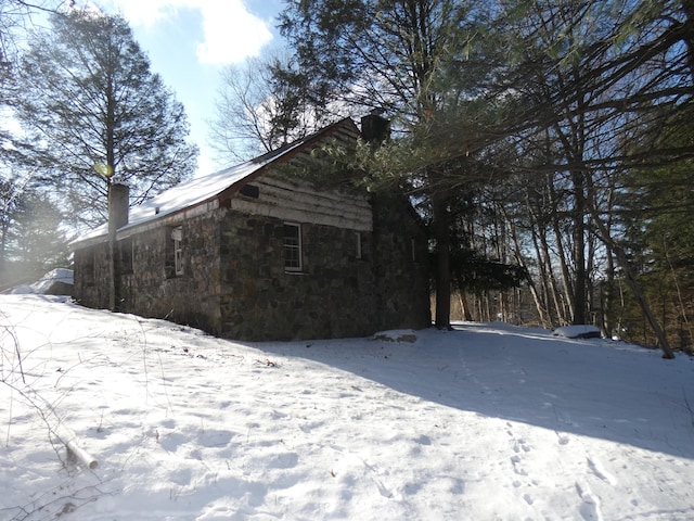 view of snow covered property