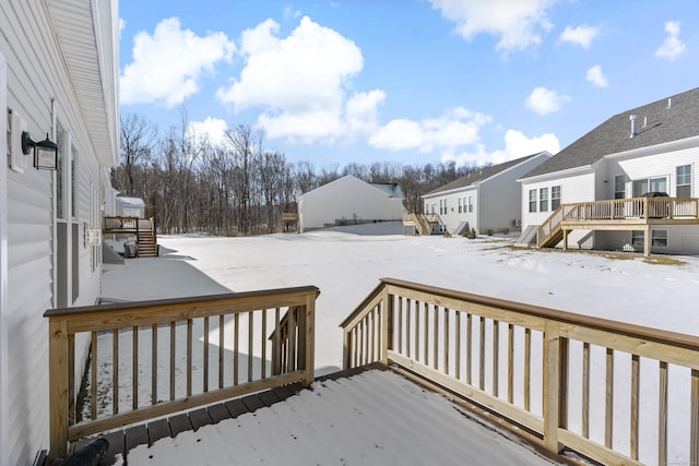 view of snow covered deck