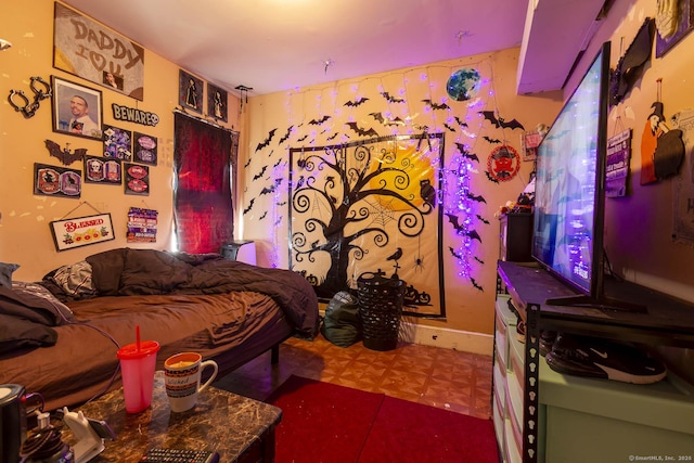 bedroom featuring parquet floors