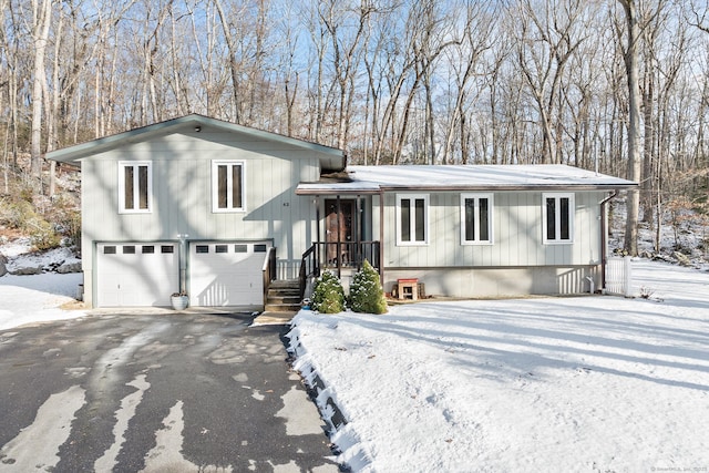 split level home featuring a garage