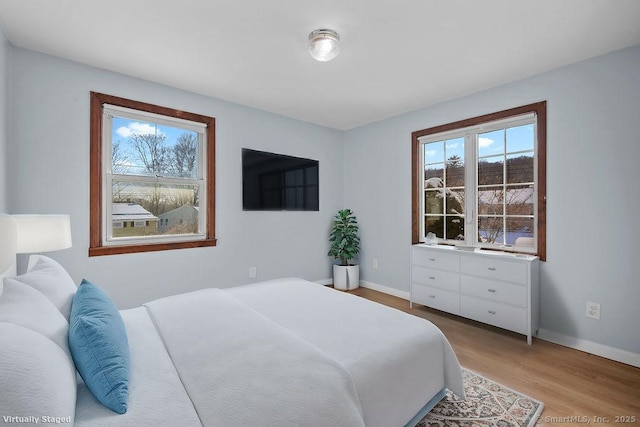 bedroom featuring light hardwood / wood-style flooring