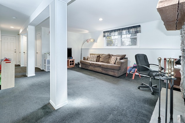 living room with dark carpet