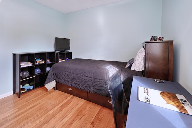 bedroom featuring hardwood / wood-style floors