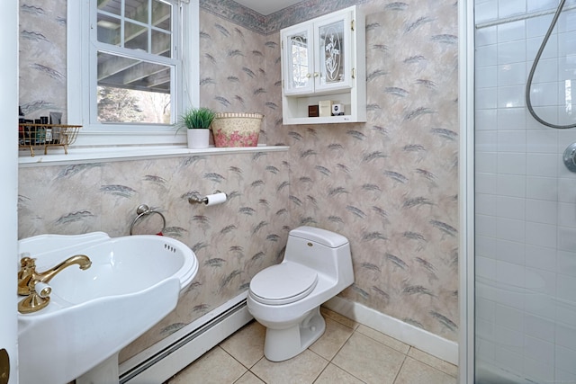 bathroom with walk in shower, tile patterned floors, toilet, sink, and a baseboard radiator