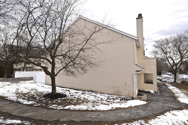 view of snow covered property