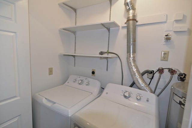 laundry room featuring washer and clothes dryer