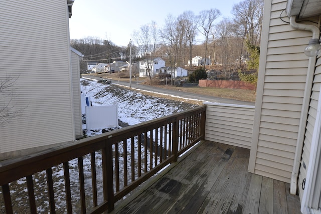 view of snow covered deck