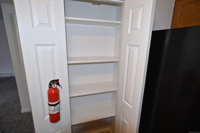 closet featuring a baseboard heating unit