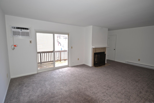 unfurnished living room with baseboard heating, a wall mounted AC, carpet floors, and a tile fireplace