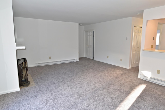 unfurnished living room with carpet and baseboard heating