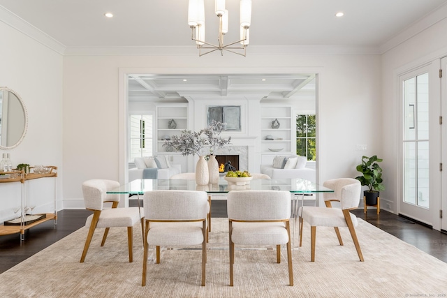 dining room featuring beam ceiling, dark hardwood / wood-style flooring, built in features, and a high end fireplace