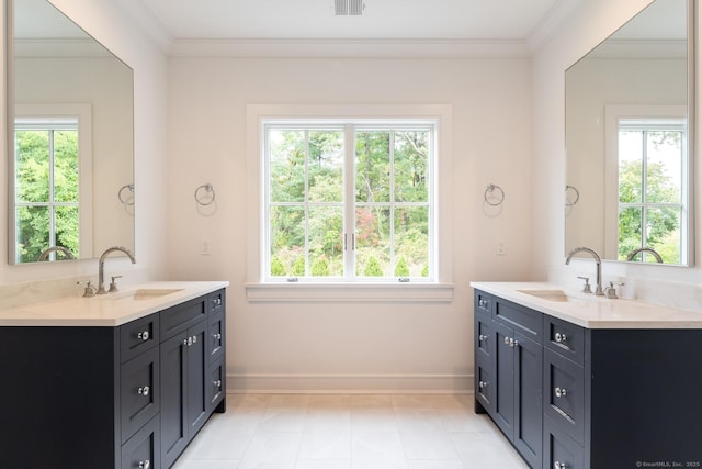 bathroom with vanity and ornamental molding