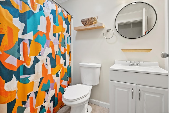 bathroom featuring vanity, curtained shower, and toilet