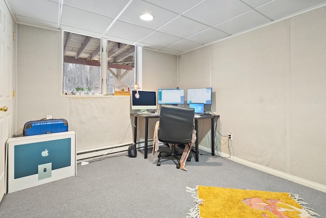 office with a baseboard radiator, carpet flooring, and a drop ceiling