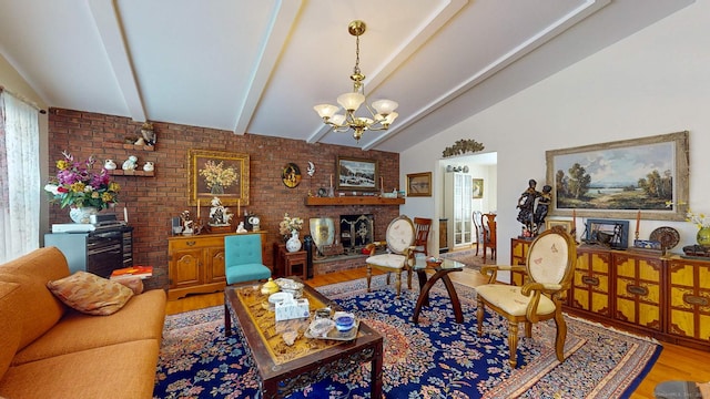 living room featuring an inviting chandelier, hardwood / wood-style floors, lofted ceiling with beams, and a brick fireplace