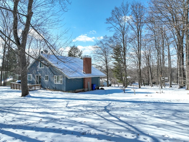 view of snow covered property