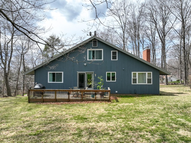 4 Alpine Dr, South Windsor, CT 06074 - rear view of property featuring a chimney, a deck, and a lawn