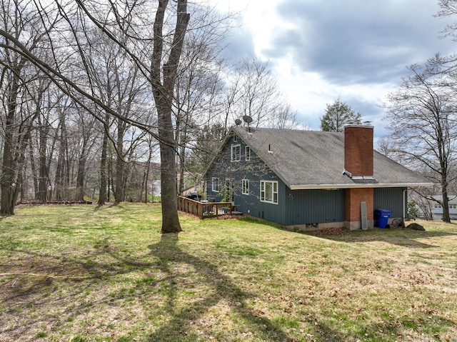 4 Alpine Dr, South Windsor, CT 06074 - view of home's exterior featuring a yard and a chimney