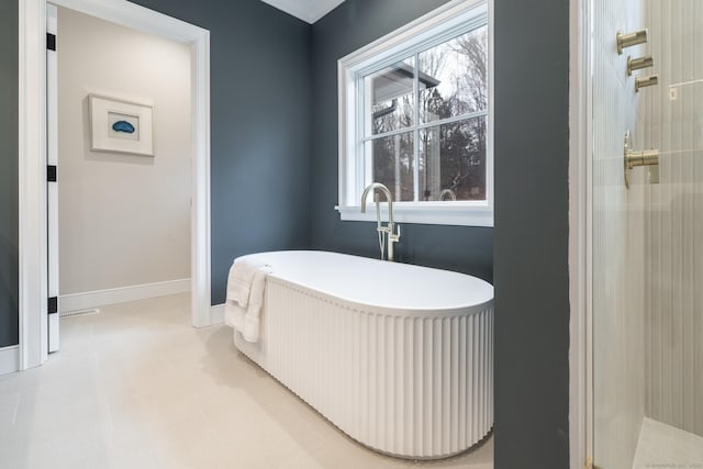 interior space featuring a wealth of natural light and a washtub